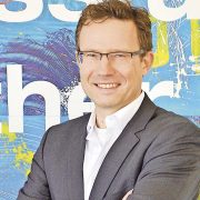 Michael Reichle berichtet, wie eine Cloud-Plattform Kollaboration und Abwicklung in Logistikketten revolutioniert.